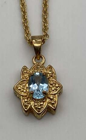 Gold-Tone Flower Pendant Necklace with Blue Stone