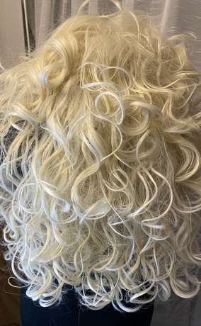 Curly Blonde Wig with Voluminous Curls