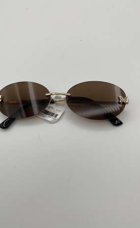 Rimless Oval Sunglasses with Butterfly Detail - Brown Tint